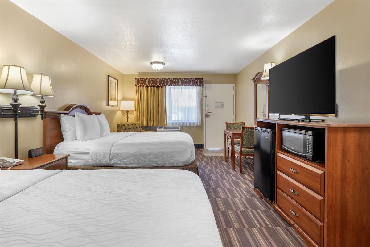 Standard Room, 2 Queen Beds, Smoking, Refrigerator & Microwave | Pillowtop beds, in-room safe, desk, blackout drapes