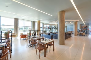 Breakfast, lunch, dinner served; Portuguese cuisine, pool views