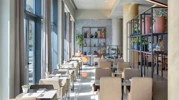 Breakfast, lunch, dinner served; Portuguese cuisine, pool views
