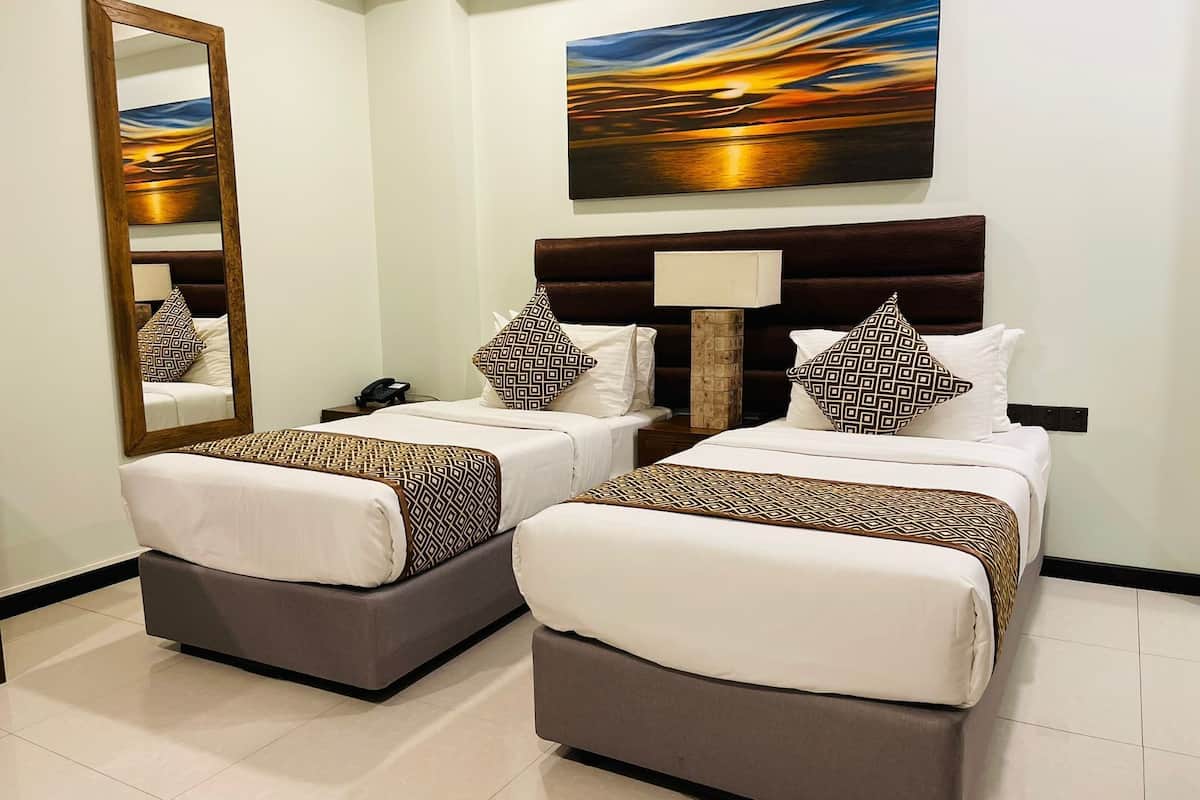 deluxe double/twin (free return airport transfer, 10% off on f&b and complimentary) | 1 bedroom, egyptian cotton sheets, premium bedding, down duvets