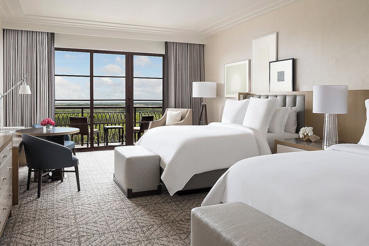 Premium bedding, down duvets, pillow-top beds, in-room safe