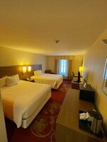 Desk, laptop workspace, iron/ironing board, free cribs/infant beds