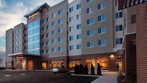 A multi-story hotel with a prominent 'Residence Inn' sign, a parking lot, and a landscaped entrance area. - Residence Inn Secaucus Meadowlands (Secaucus)