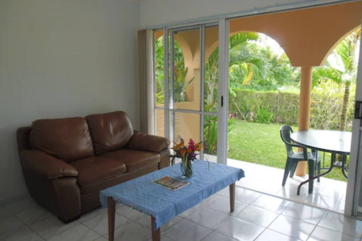 2 Bedroom Ocean Breeze Apartment | Living room | Flat-screen TV, DVD player