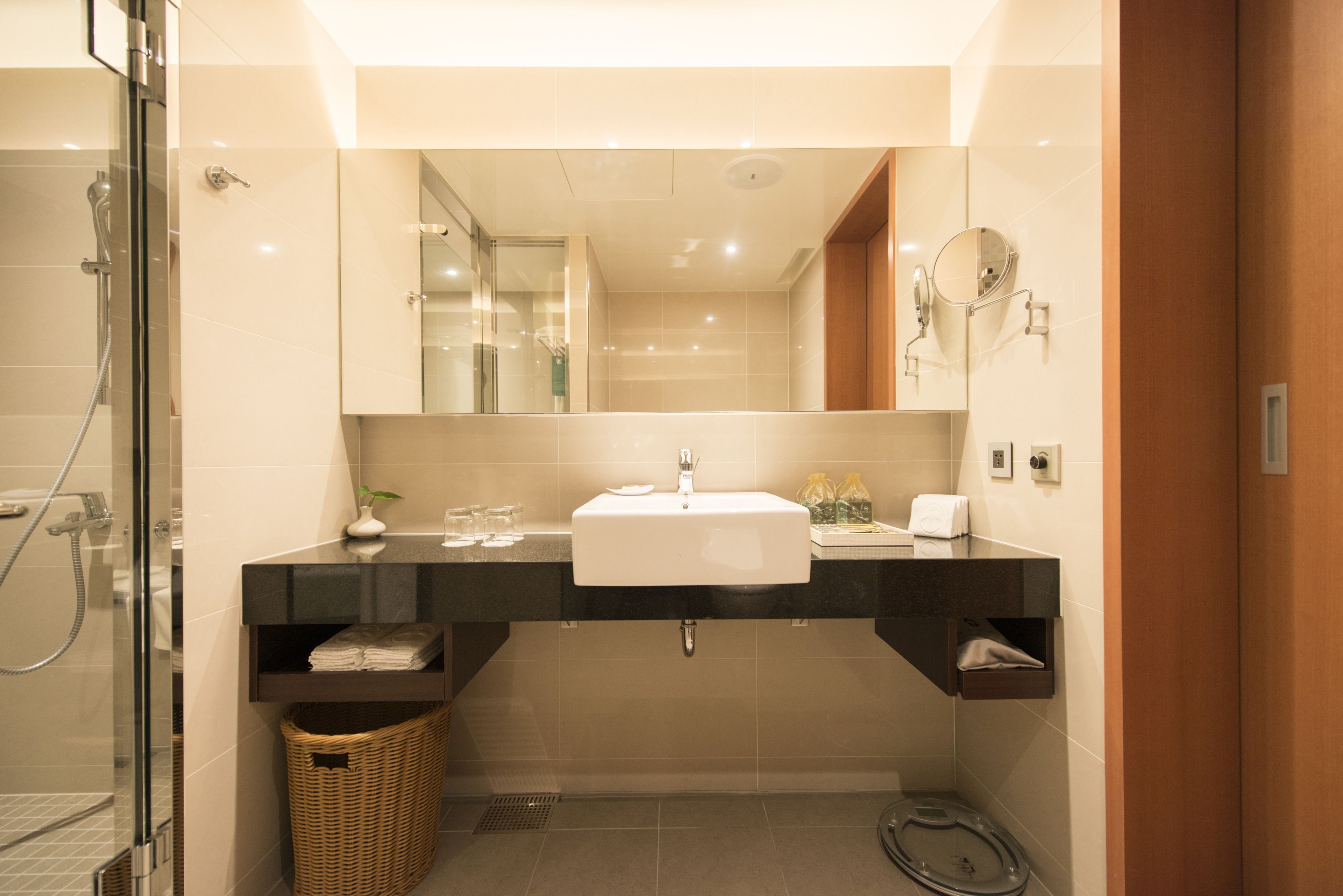 kids family room | bathroom | separate bathtub and shower, hair dryer, slippers, towels