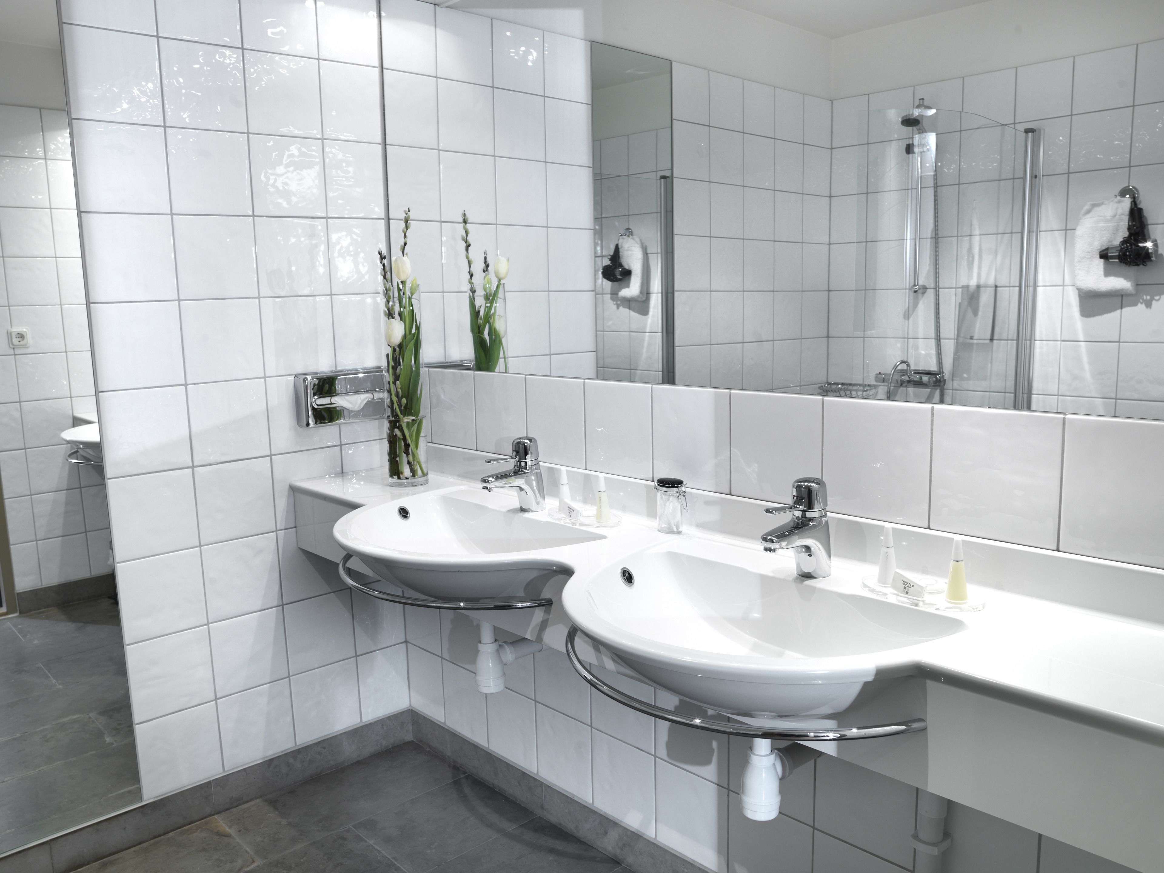 deluxe double room (sofa bed) | bathroom | shower, hair dryer, towels