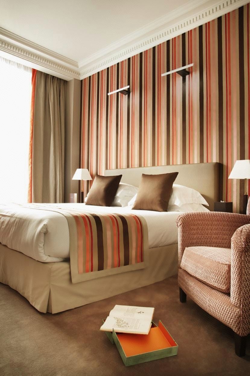 Luxe beddengoed, een minibar, een kluis op de kamer, een bureau