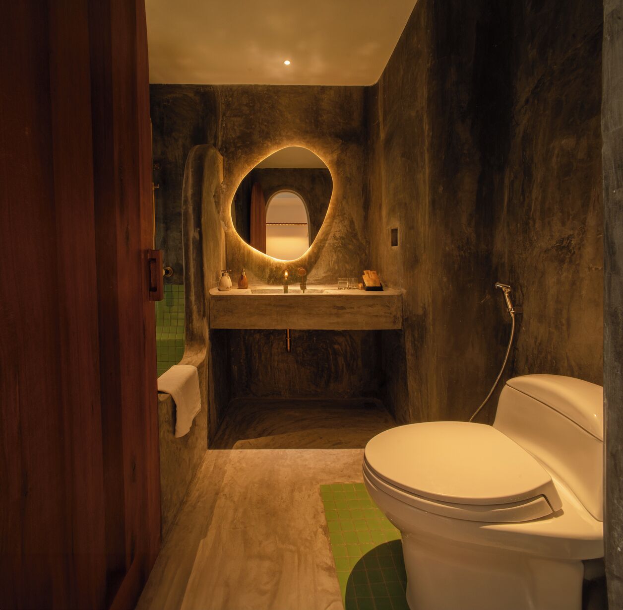 rustic twin room ocean view | bathroom | eco-friendly toiletries, hair dryer, slippers, bidet