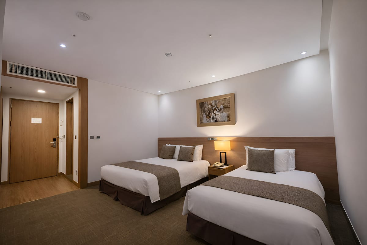 Inside Deluxe Twin - No window | Premium bedding, down comforters, in-room safe, desk