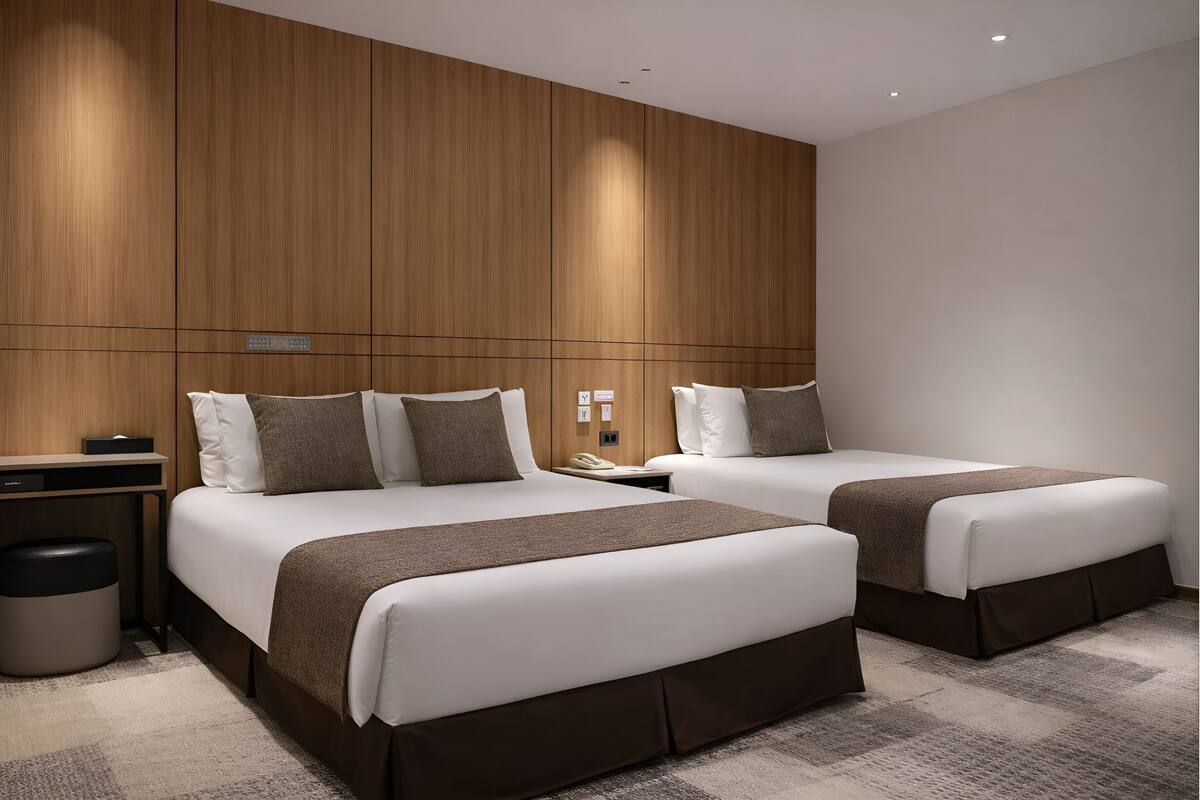 Accessible Twin Room | Sengetøy av topp kvalitet, dundyner, safe på rommet og blendingsgardiner