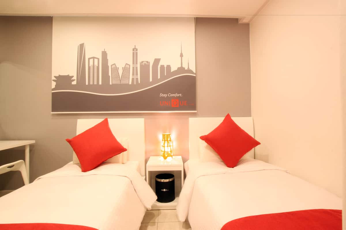 Chambre avec lits jumeaux