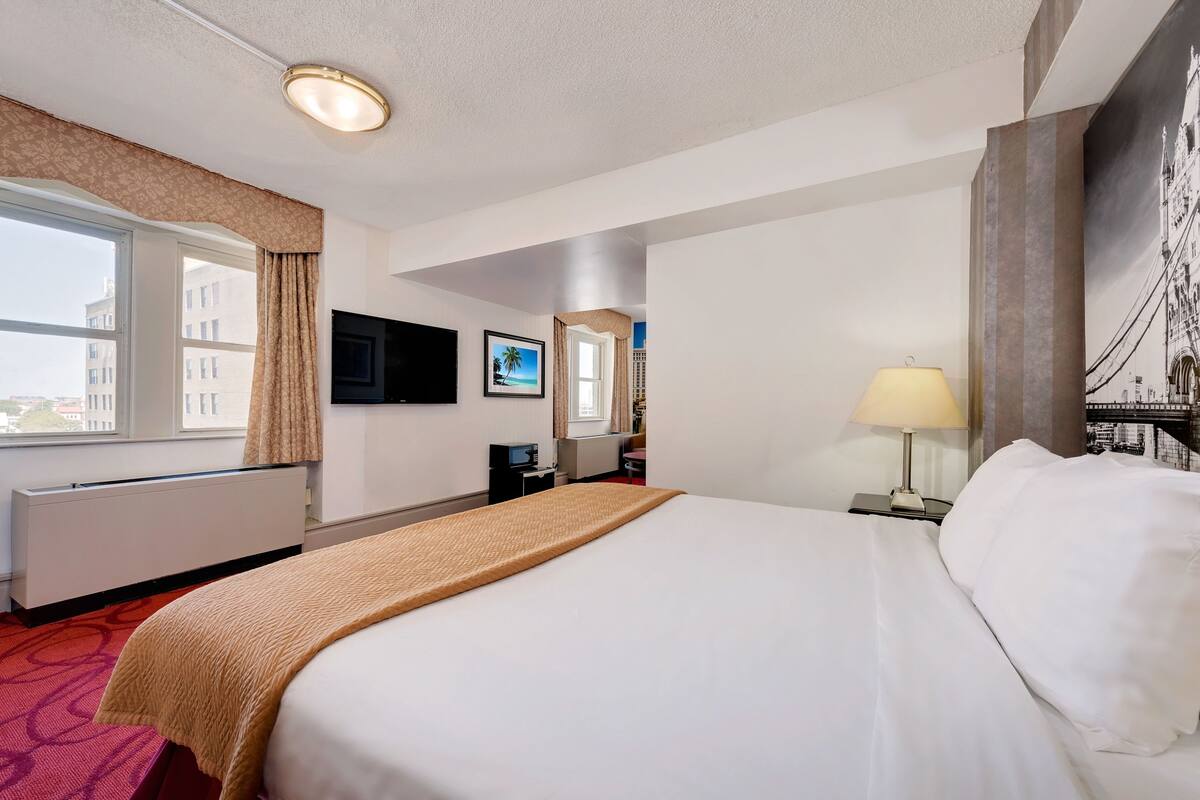 Blackout drapes, iron/ironing board, WiFi (free), alarm clocks