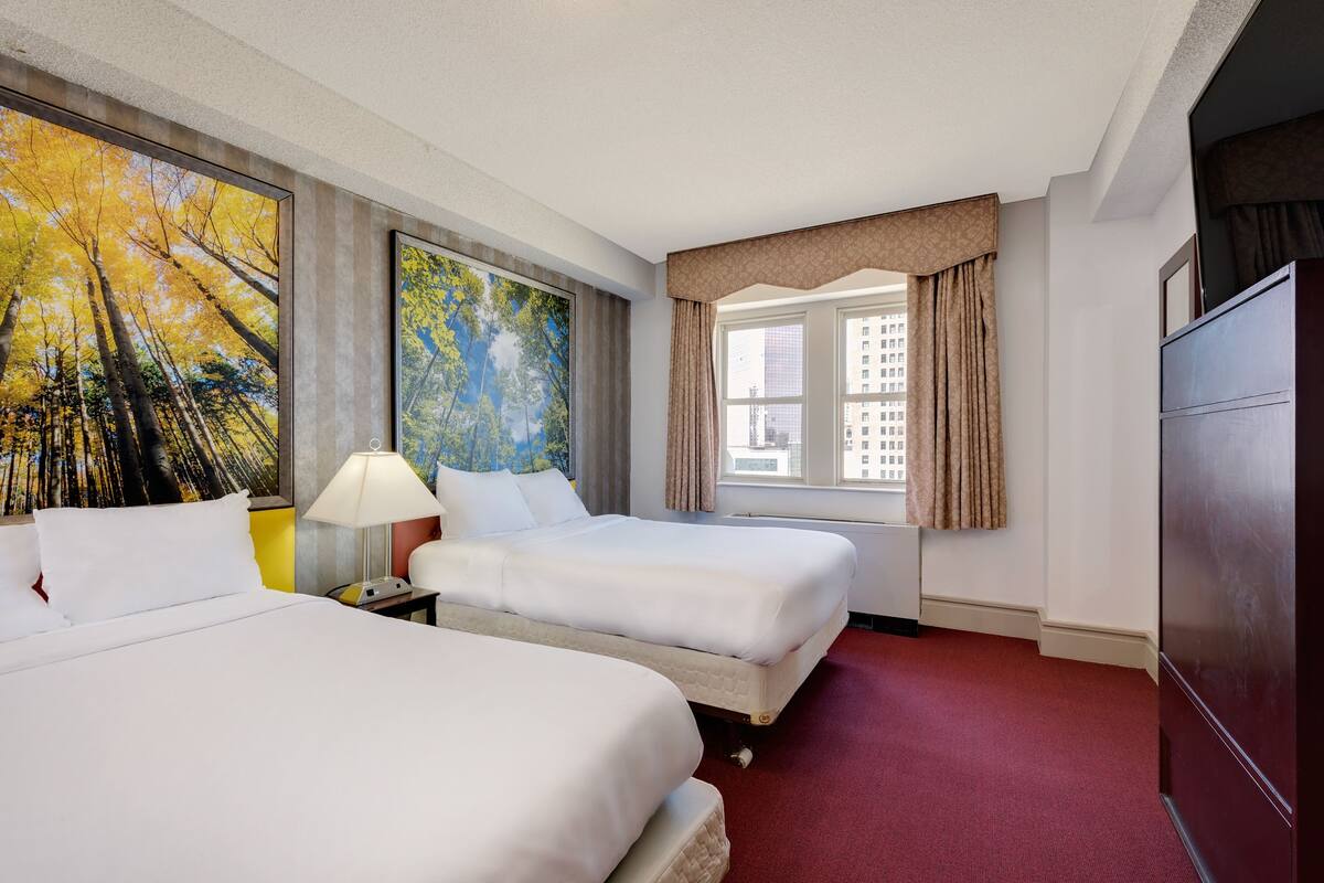 Blackout drapes, iron/ironing board, WiFi (free), alarm clocks
