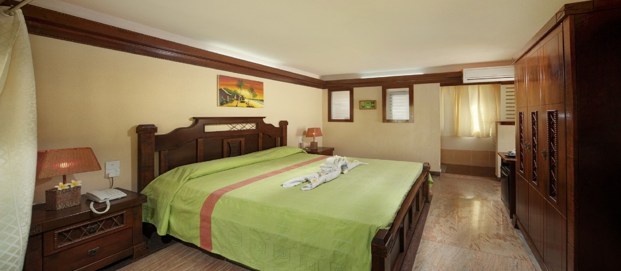 In-room safe, desk, blackout drapes, free cribs/infant beds