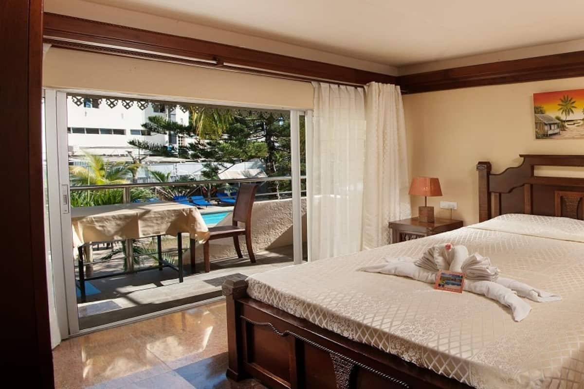 In-room safe, desk, blackout drapes, free cribs/infant beds