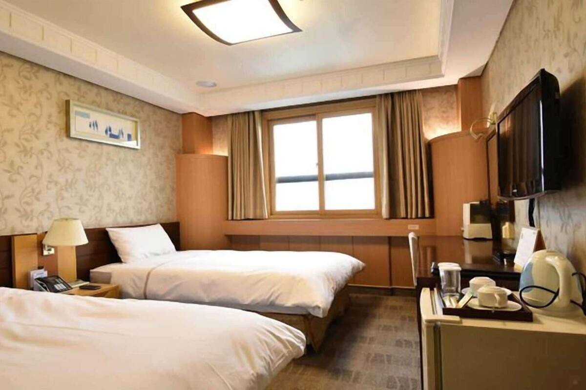 Ropa de cama de alta calidad y minibar
