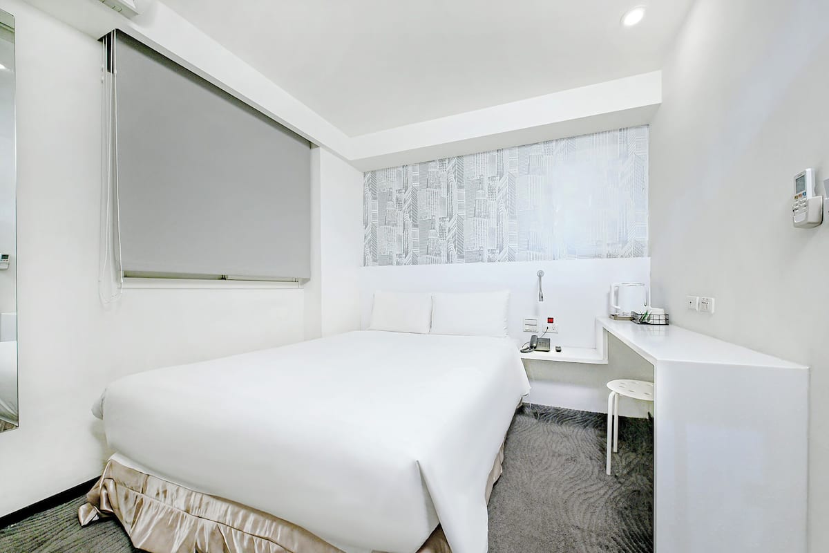Standard Double Room, No Windows | Down comforters, desk, free WiFi, bed sheets