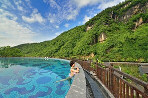 Indoor pool, outdoor pool, open 10:30 AM to 10:30 PM, pool umbrellas