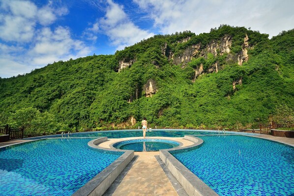 Indoor pool, outdoor pool, open 10:30 AM to 10:30 PM, pool umbrellas