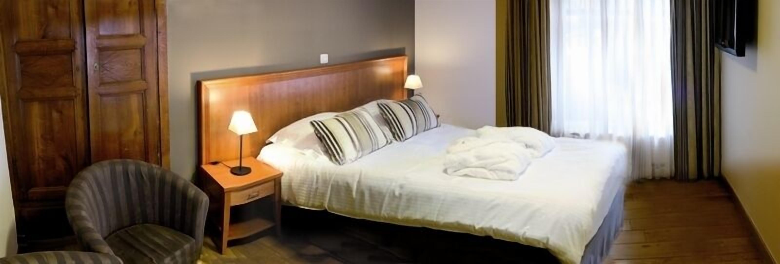 deluxe double room | premium bedding, in-room safe, blackout curtains, soundproofing
