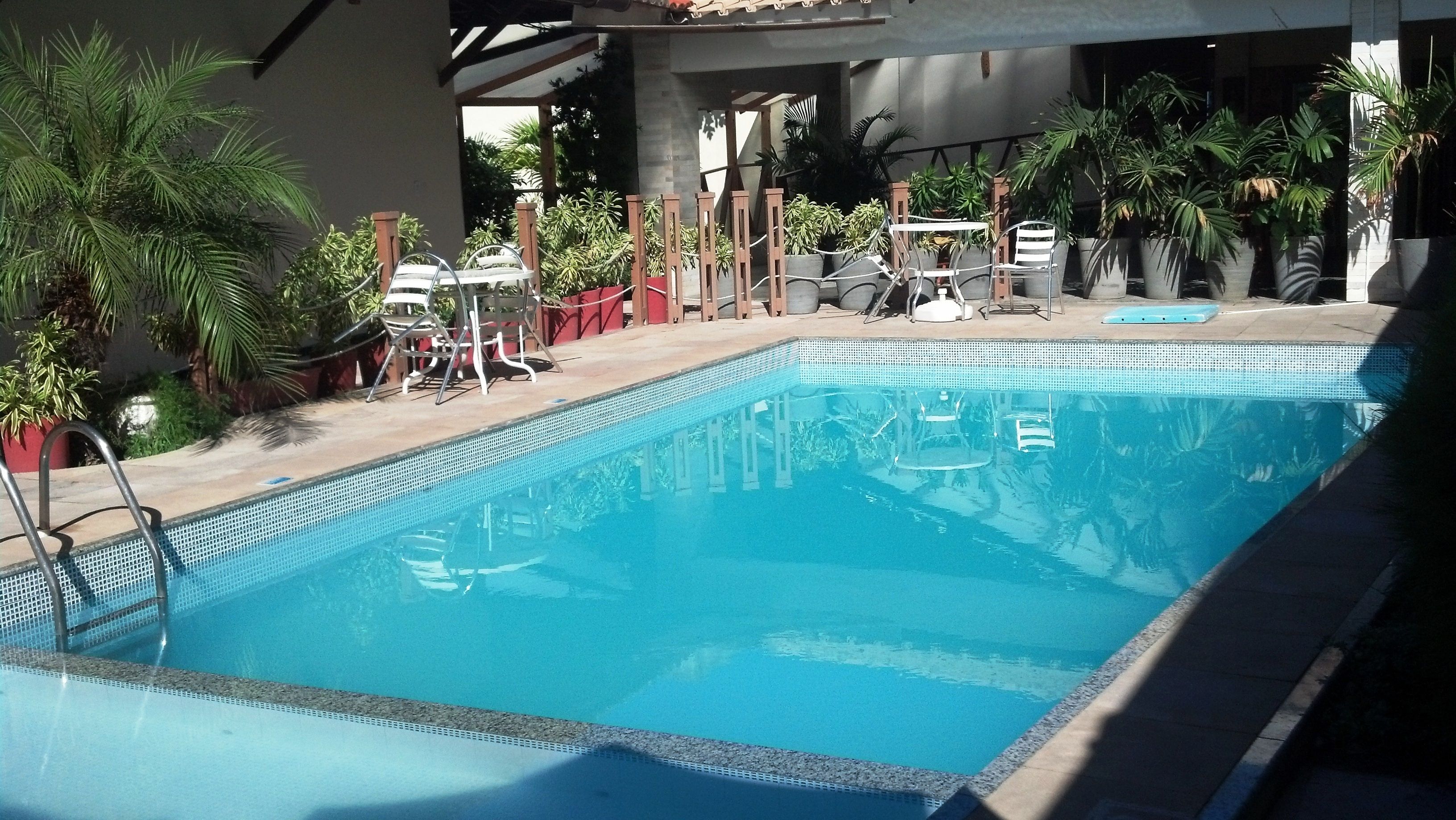 outdoor pool, pool loungers