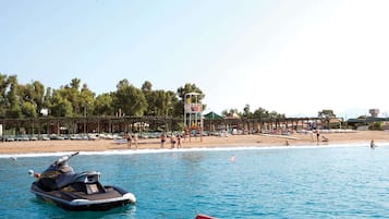 Private beach, free beach shuttle, free beach cabanas, sun loungers