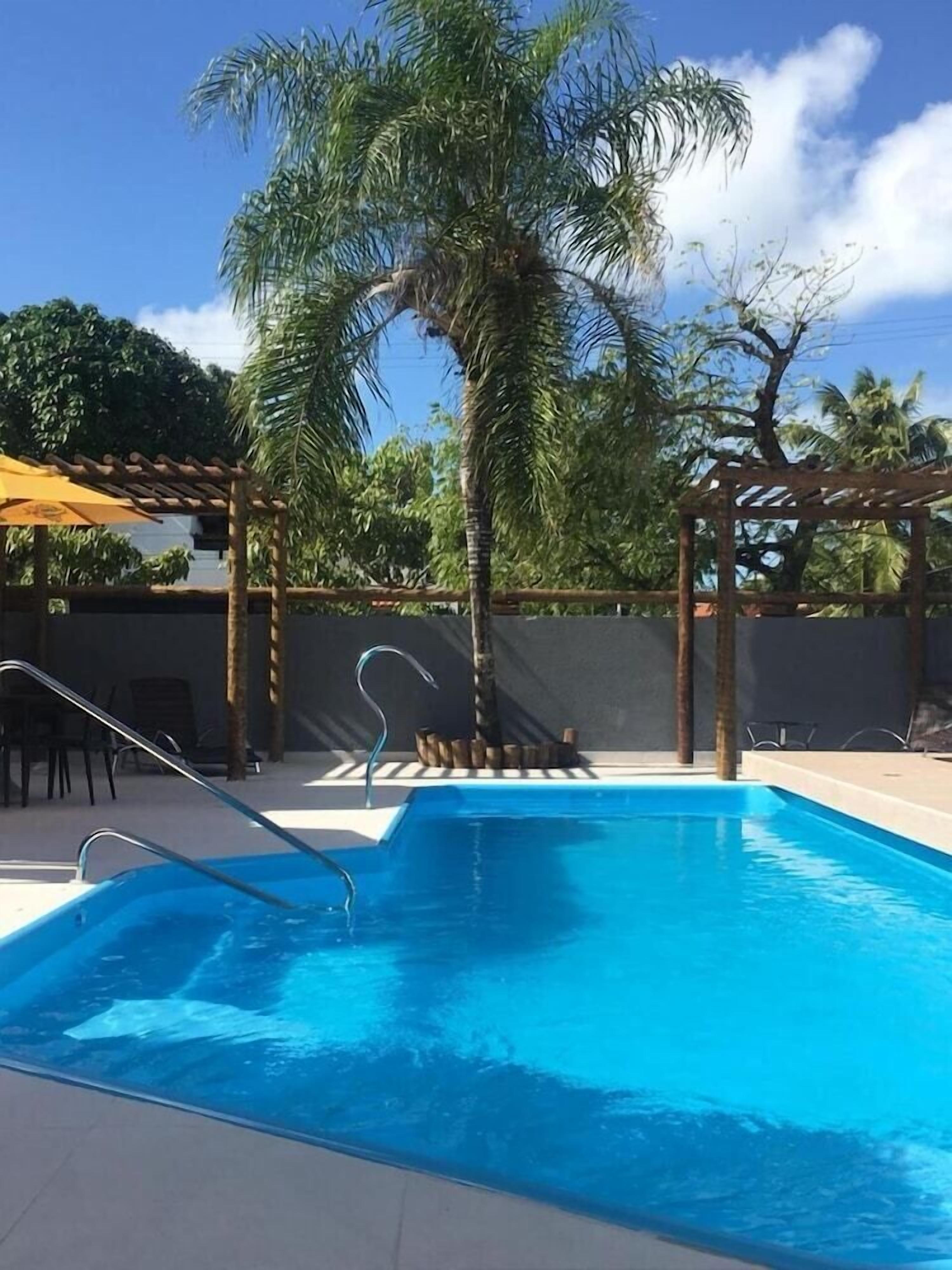 Outdoor pool, pool umbrellas, pool loungers