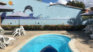 Outdoor pool, pool umbrellas, pool loungers