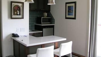 Luxury Suite | Private kitchenette | Mini-fridge, coffee/tea maker