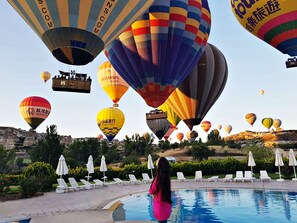 Outdoor pool, free cabanas, pool umbrellas