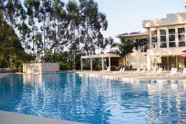 Outdoor pool, free pool cabanas, pool umbrellas