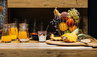 Daily buffet breakfast (EUR 18 per person)