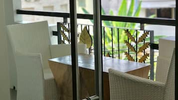 Baipho Suite Room | Minibar, in-room safe, laptop workspace, blackout curtains
