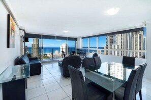 Executive Apartment, 3 Bedrooms, Ocean View | Living area | TV