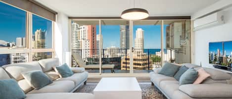 Premium Apartment, 3 Bedrooms, Ocean View | Living area | TV