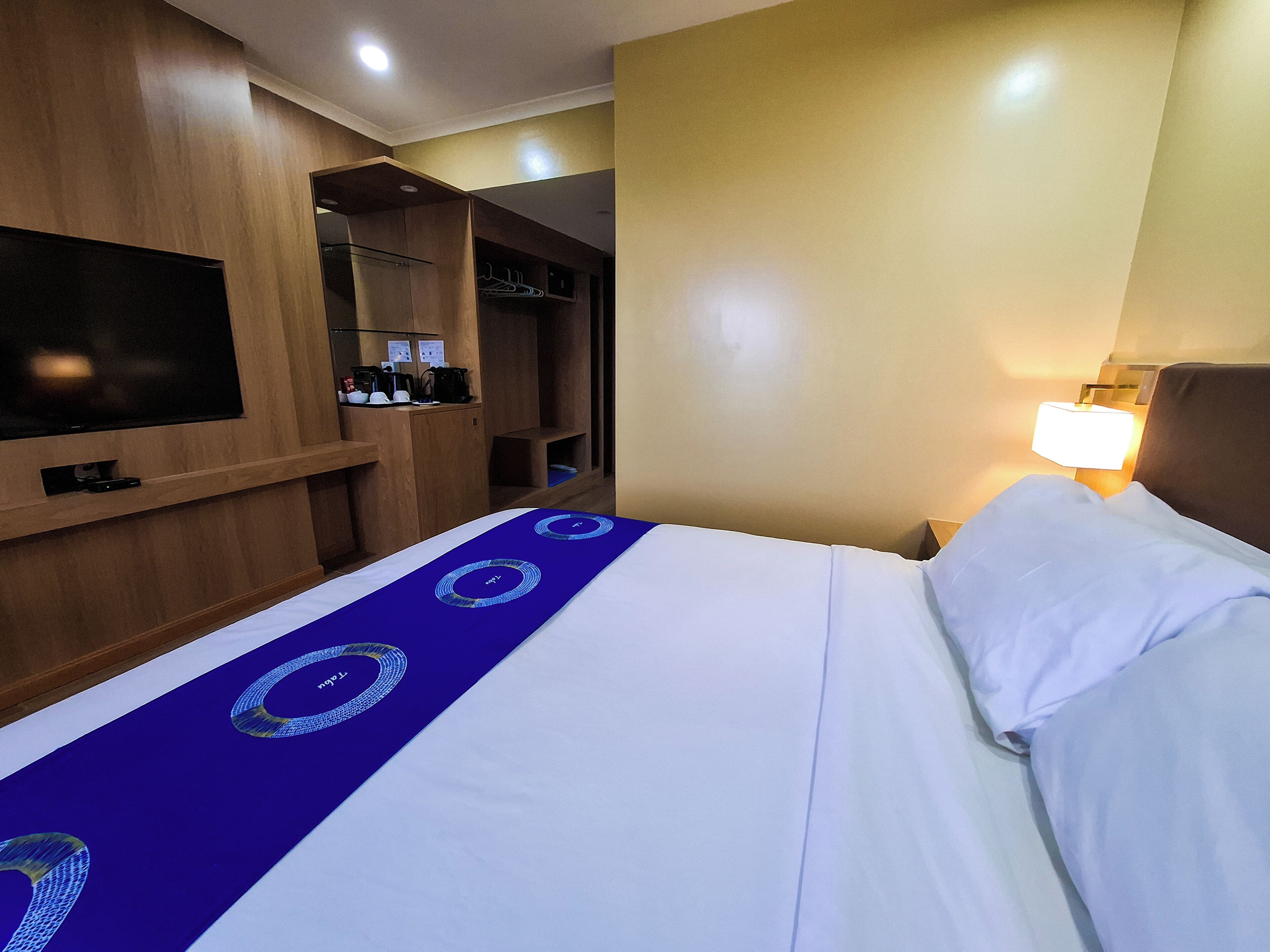 Premium bedding, desk, blackout drapes, iron/ironing board