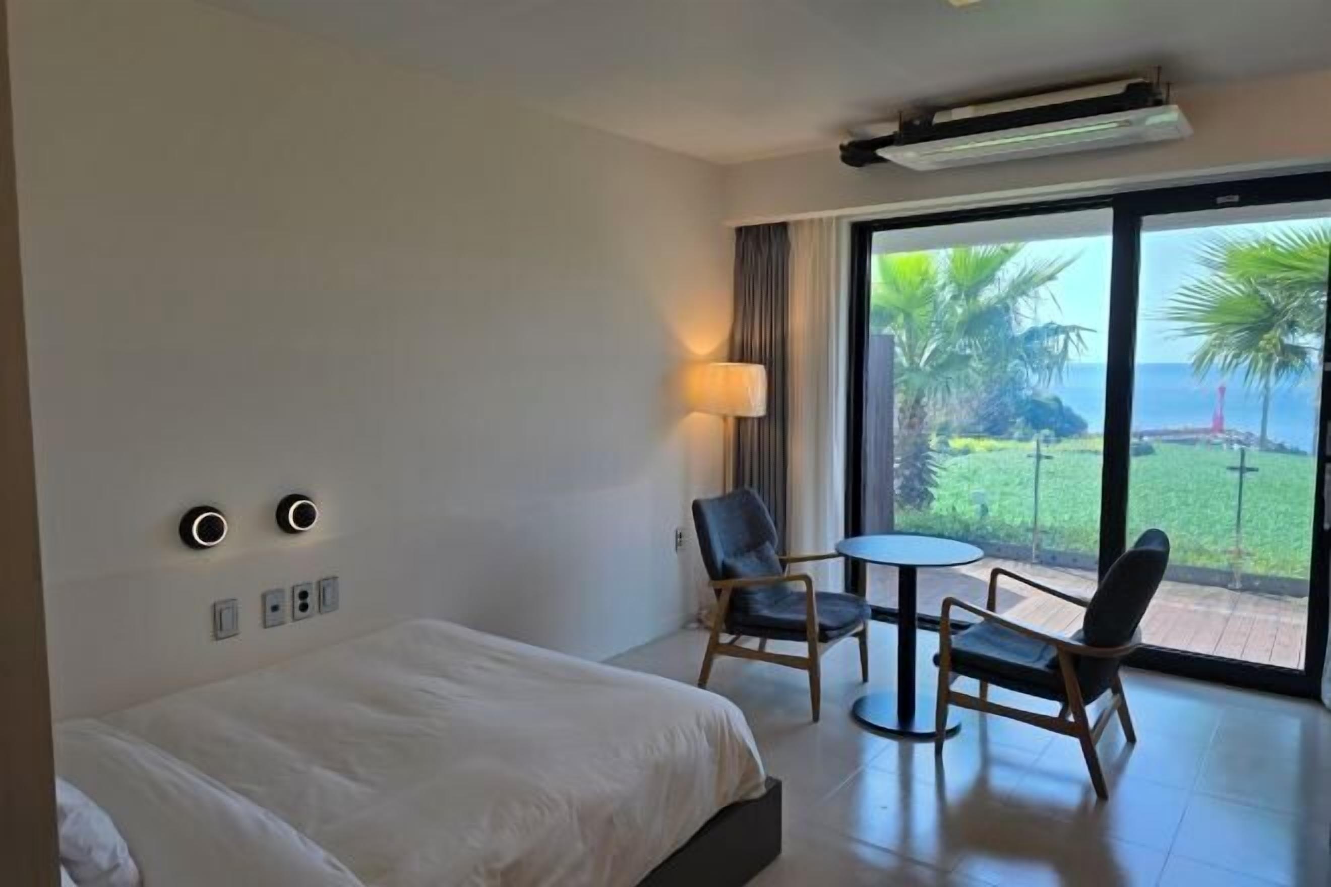 Premium bedding, down duvets, in-room safe, desk