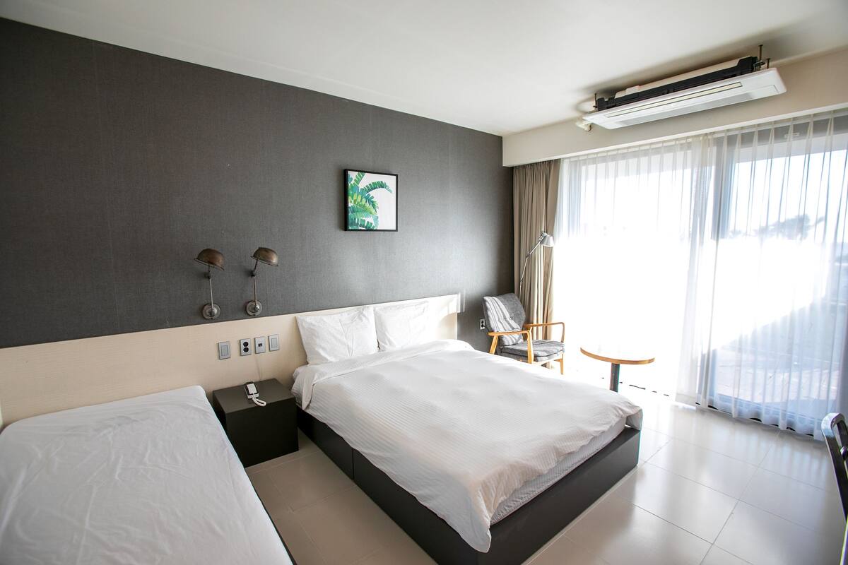 Premium bedding, down duvets, in-room safe, desk