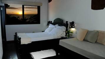 Deluxe Room | Minibar, blackout drapes, free WiFi