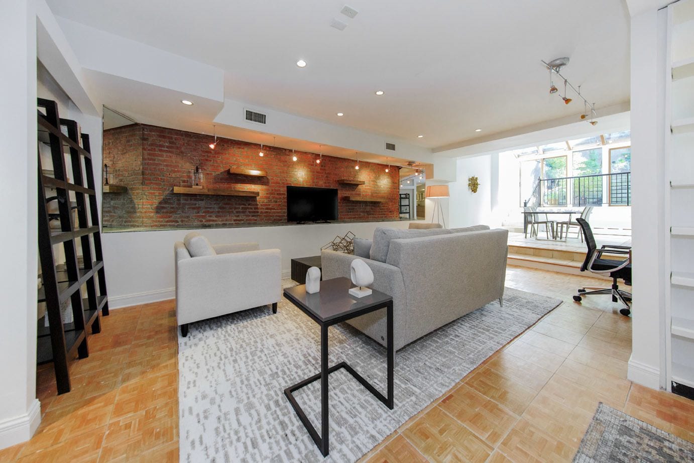 Studiosuite – deluxe | Oppholdsområde | Flatskjerm-TV, iPod-dokkingstasjon og printere