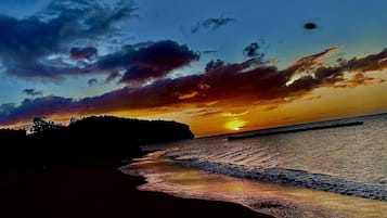 Beach nearby, black sand, 2 beach bars