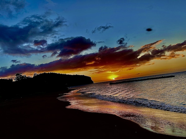 Beach nearby, black sand, 2 beach bars