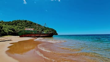 Beach nearby, black sand, 2 beach bars