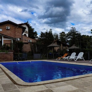 Outdoor pool, pool umbrellas, pool loungers