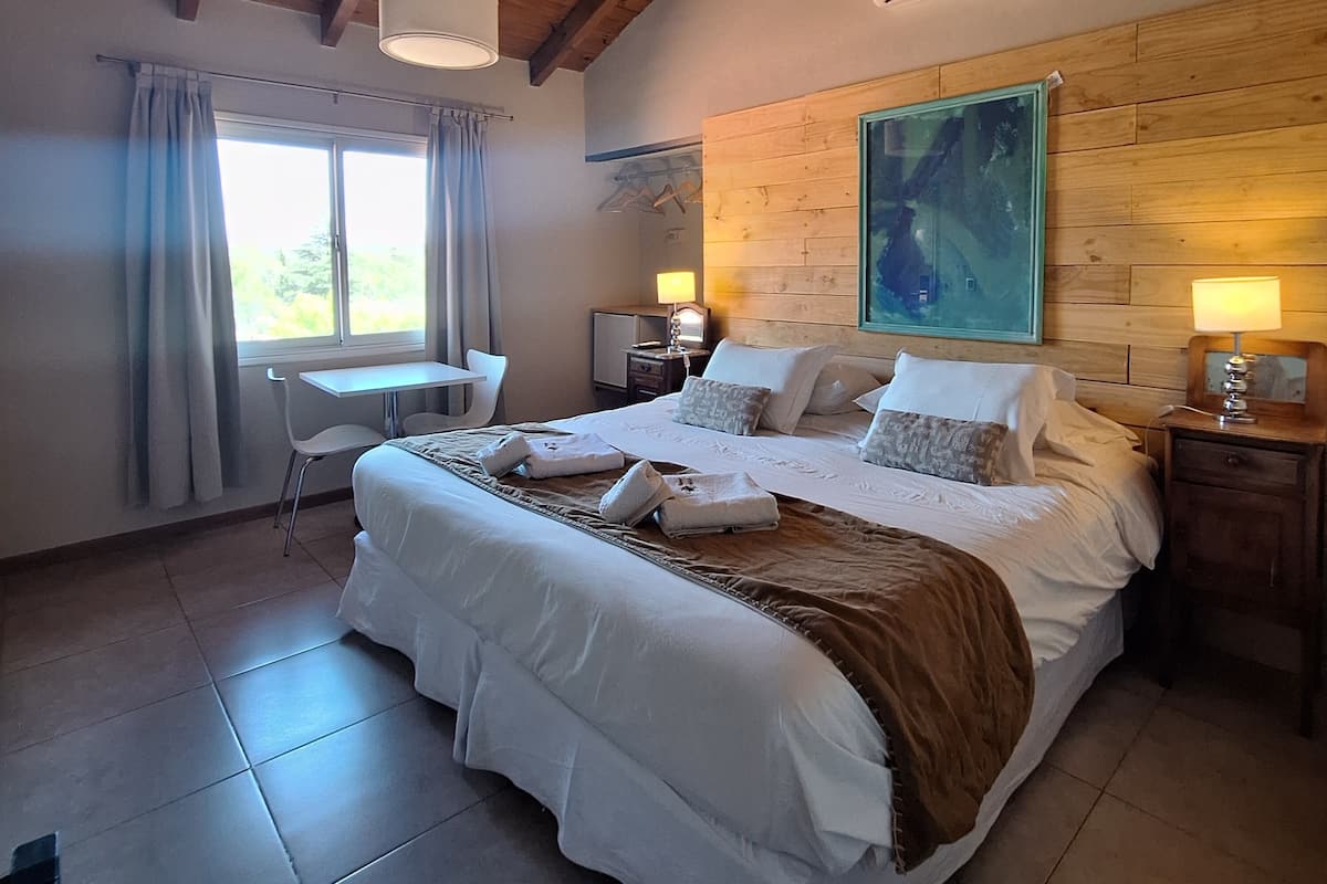 Superior Double Room | Minibar, in-room safe, individually decorated, cots/infant beds