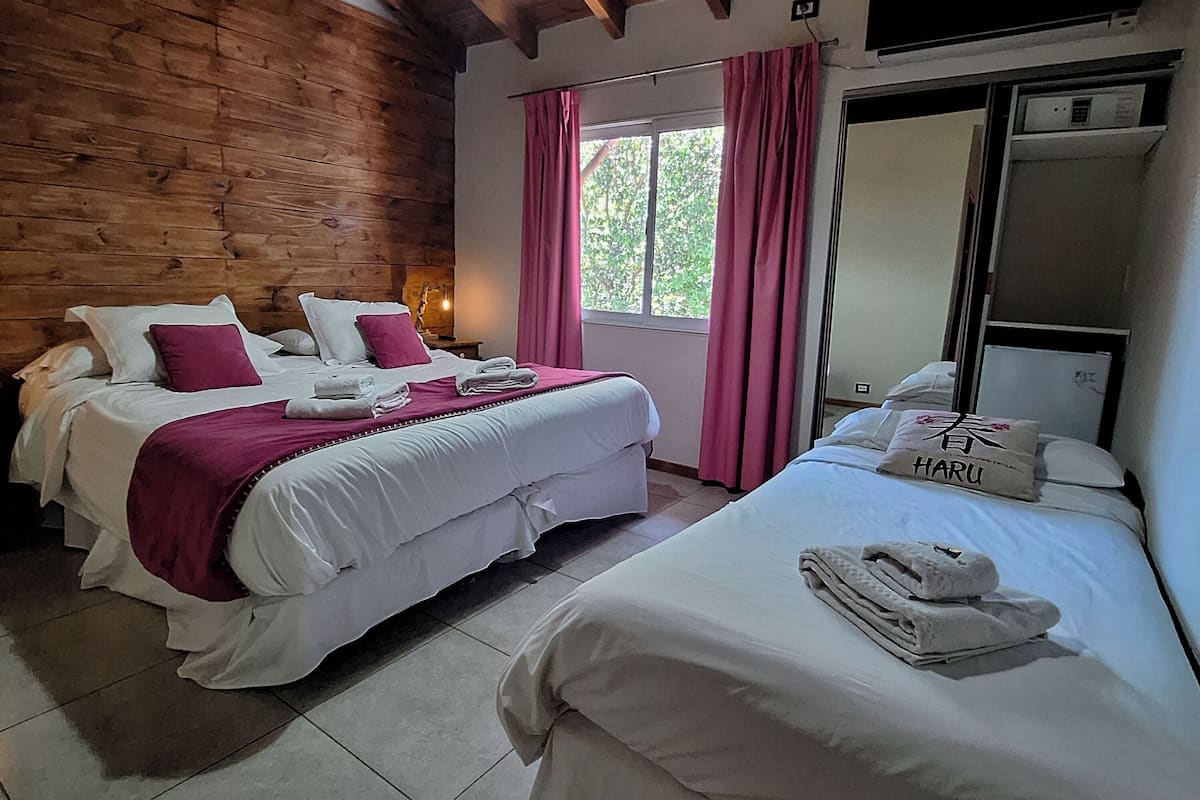 Standard Triple Room | Minibar, in-room safe, individually decorated, cots/infant beds