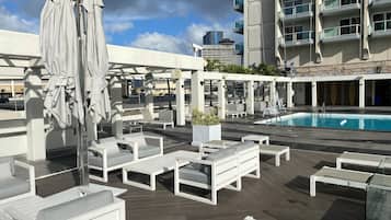 Outdoor pool, open 8:00 AM to 6:00 PM, sun loungers