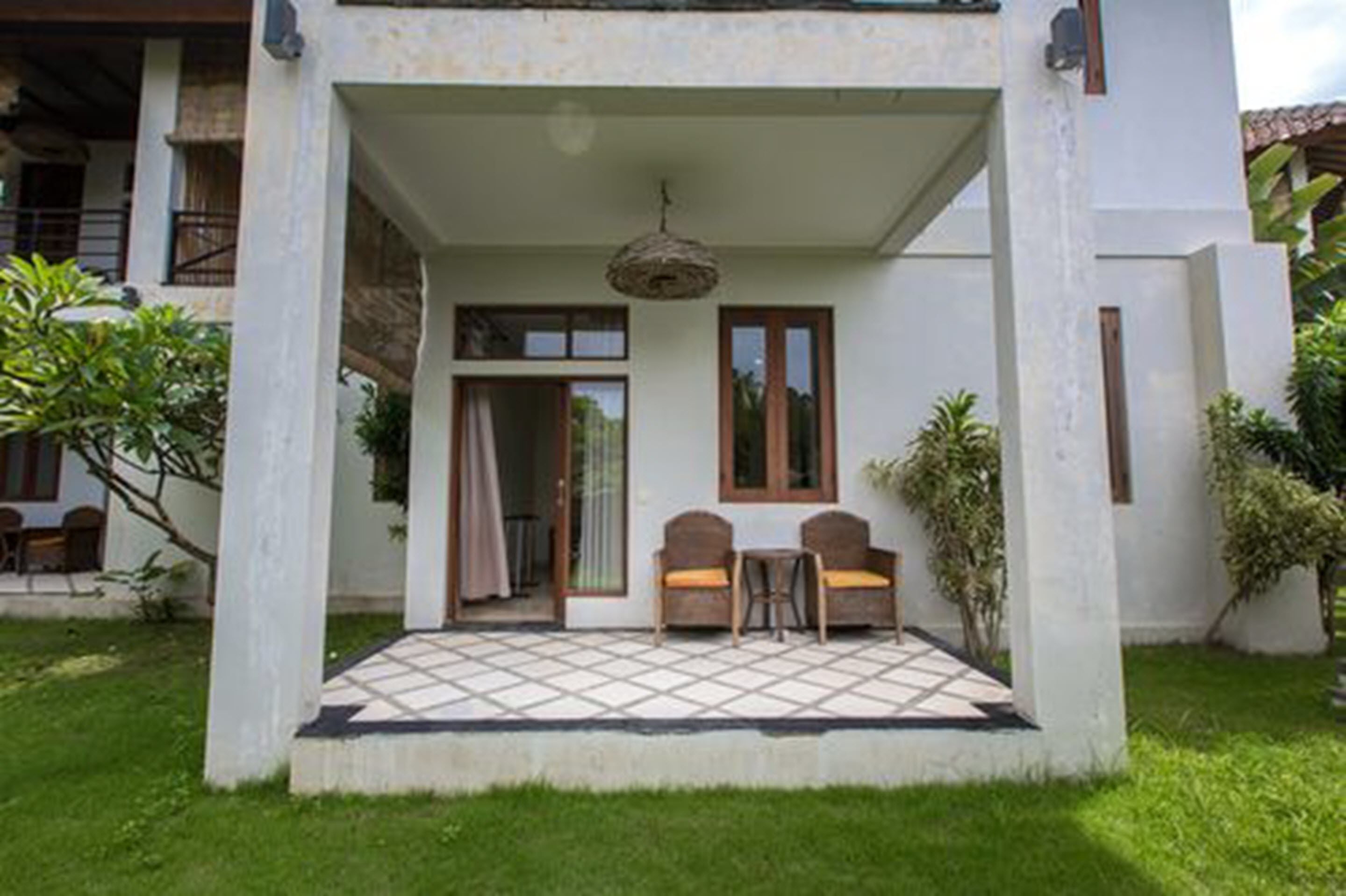 suite, garden view | terrace/patio