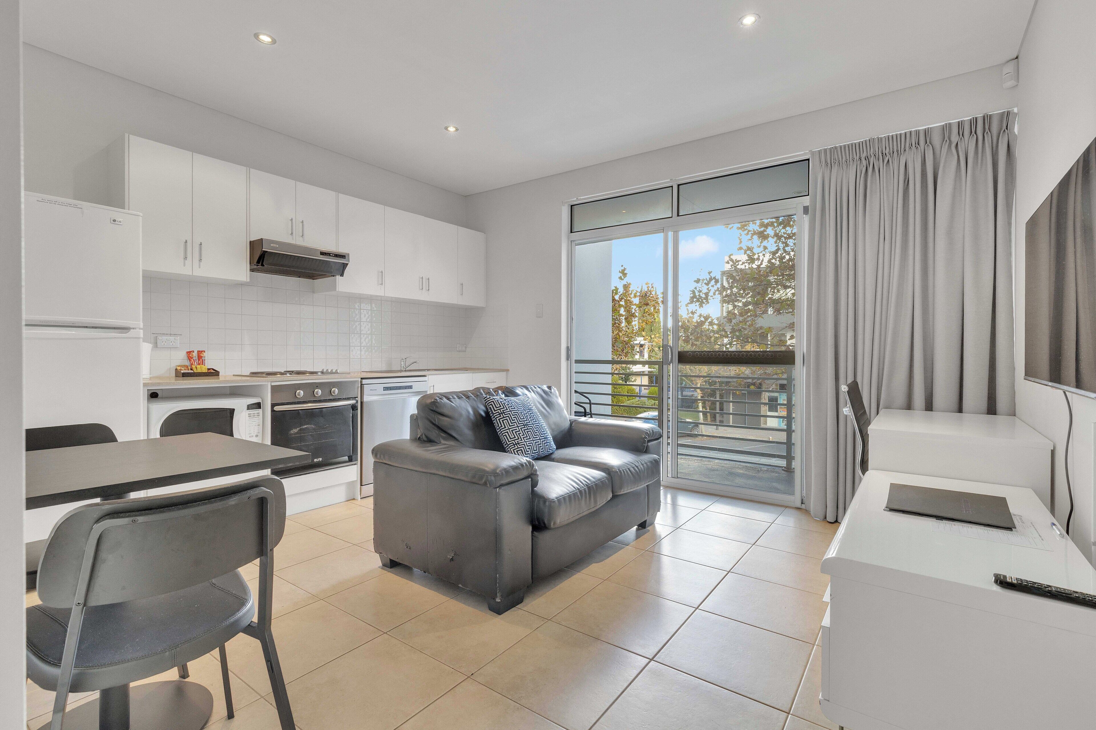 1 Bedroom Studio - Offsite and stair access only | Living area | TV