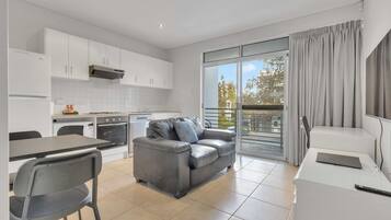 1 Bedroom Studio - Offsite and stair access only | Living area | TV